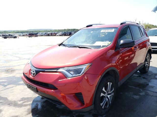 Photo 2 from auction – 2016 TOYOTA RAV4 LE with VIN JTMZFREV4GJ095469