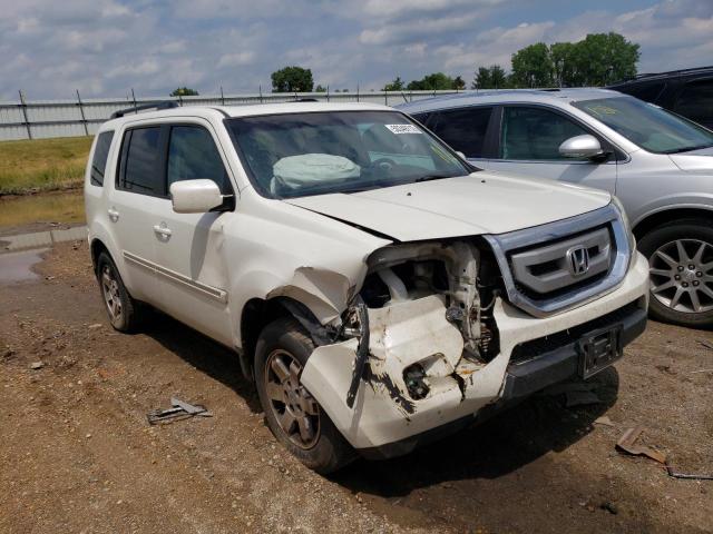 HONDA PILOT TOUR 2011 with VIN 5FNYF4H92BB086802 - Photo from auction