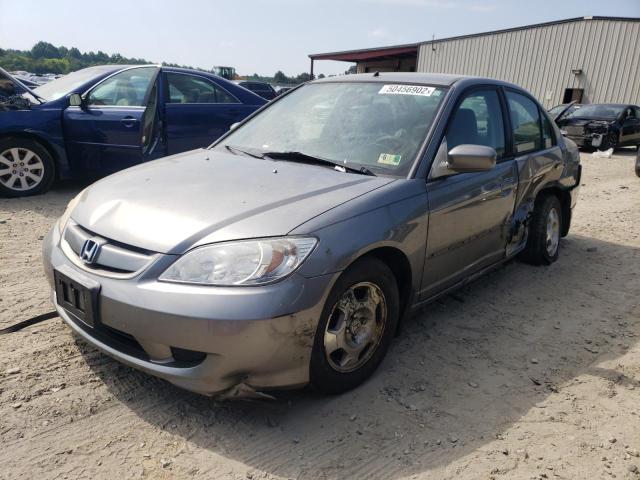 Photo 2 from auction – 2004 HONDA CIVIC HYBR with VIN JHMES95634S009530