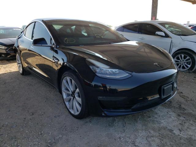 TESLA MODEL 3 2018 with VIN 5YJ3E1EA4JF009311 - Photo from auction