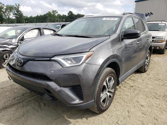 Photo 2 from auction – 2018 TOYOTA RAV4 LE with VIN 2T3ZFREV0JW429067