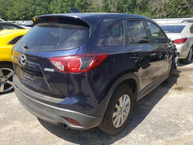 Photo 4 from auction – 2014 MAZDA CX-5 TOURI with VIN JM3KE2CY3E0330057