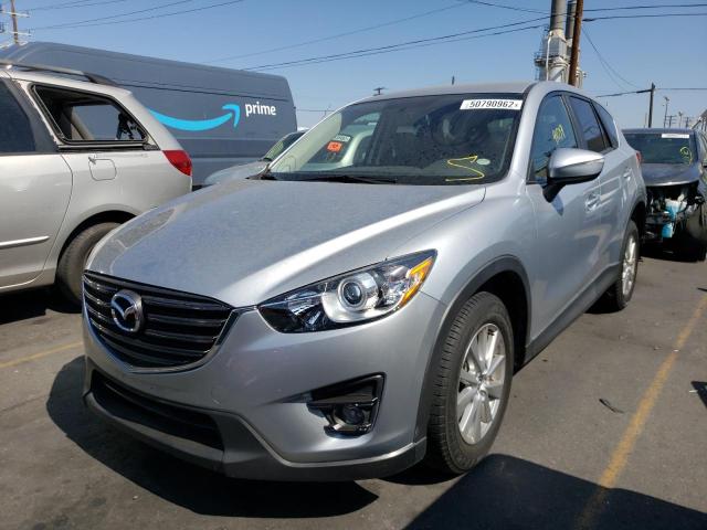 Photo 2 from auction – 2016 MAZDA CX-5 TOURI with VIN JM3KE2CY1G0774945
