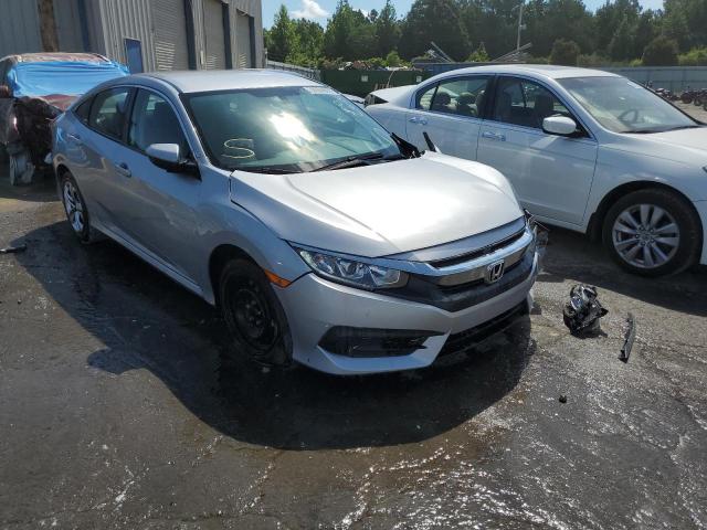 HONDA CIVIC LX 2018 with VIN 19XFC2F58JE005357 - Photo from auction