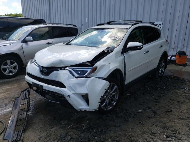 Photo 2 from auction – 2018 TOYOTA RAV4 LIMIT with VIN JTMDFREV1JD237485