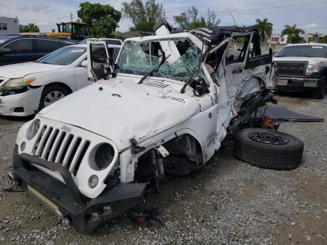 Photo 2 from auction – 2016 JEEP WRANGLER U with VIN 1C4BJWEG4GL233533
