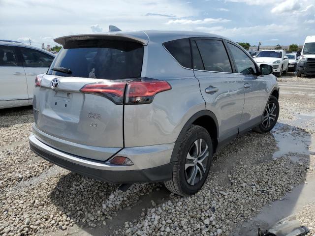 Photo 4 from auction – 2018 TOYOTA RAV4 LE with VIN 2T3ZFREVXJW407206