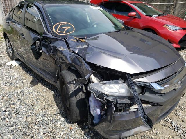 Photo 9 from auction – 2017 HONDA CIVIC LX with VIN 19XFC2F54HE025633