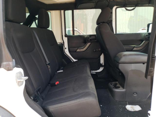 Photo 6 from auction – 2015 JEEP WRANGLER U with VIN 1C4BJWDG0FL653757