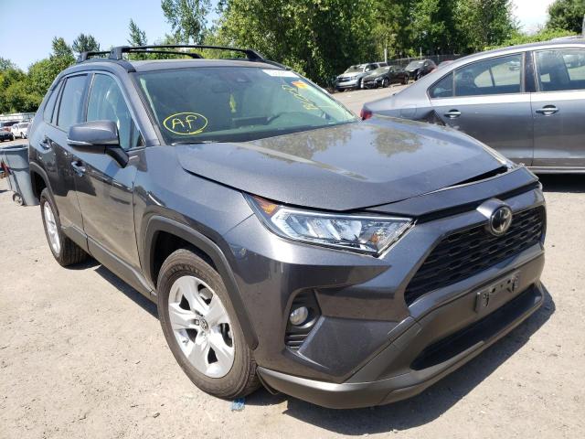 TOYOTA RAV4 XLE 2019 with VIN JTMP1RFV2KD045102 - Photo from auction