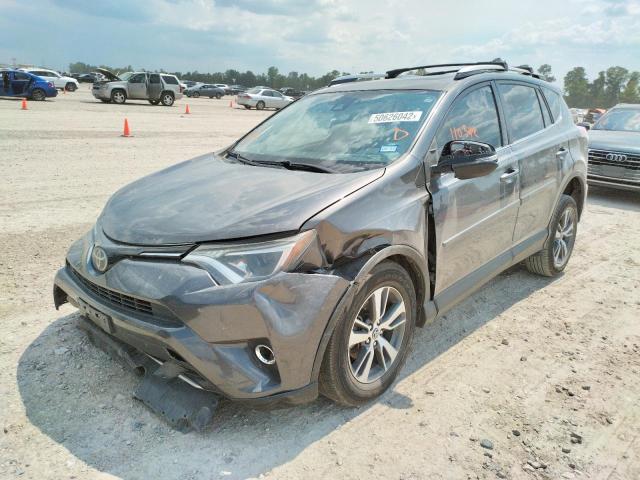 Photo 2 from auction – 2017 TOYOTA RAV4 XLE with VIN JTMWFREV6HJ101227