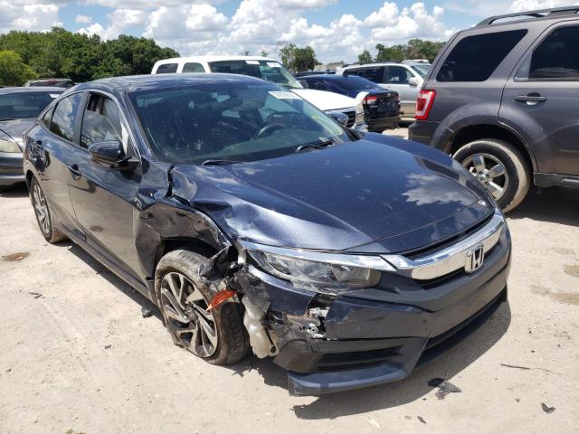 HONDA CIVIC EX 2017 with VIN 19XFC2F74HE056186 - Photo from auction