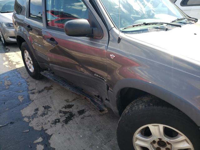 Photo 9 from auction – 2002 FORD ESCAPE XLT with VIN 1FMYU04142KD95460