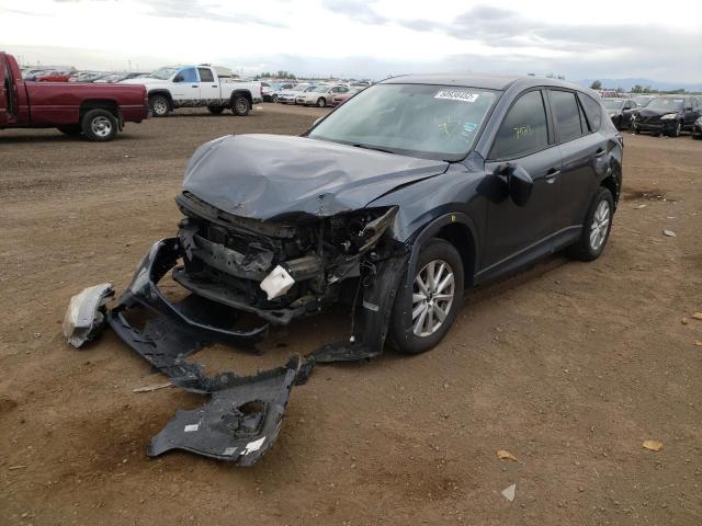 Photo 2 from auction – 2013 MAZDA CX-5 SPORT with VIN JM3KE2BEXD0104605