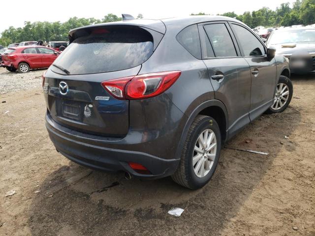 Photo 4 from auction – 2014 MAZDA CX-5 TOURI with VIN JM3KE4CY1E0312099