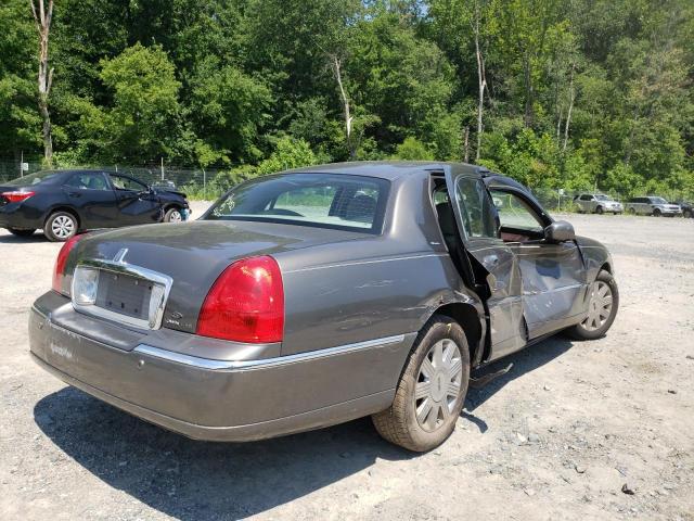 Photo 4 from auction – 2004 LINCOLN TOWN CAR U with VIN 1LNHM83W14Y658404