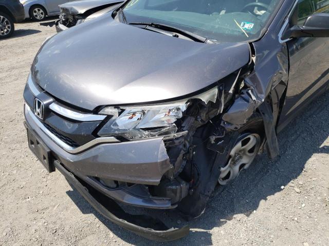 Photo 9 from auction – 2015 HONDA CR-V LX with VIN 5J6RM4H39FL085312