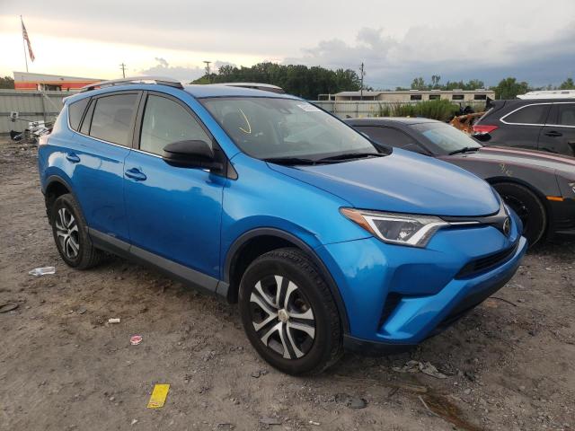 TOYOTA RAV4 LE 2018 with VIN 2T3ZFREV9JW407844 - Photo from auction