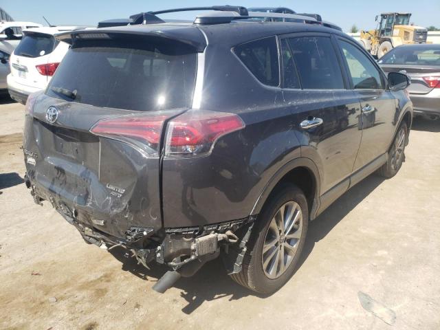 Photo 4 from auction – 2016 TOYOTA RAV4 LIMIT with VIN JTMDFREV7GD184767