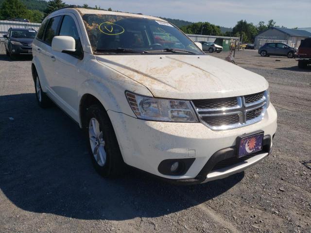 DODGE JOURNEY SX 2014 with VIN 3C4PDDBG6ET297709 - Photo from auction