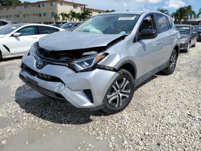 Photo 2 from auction – 2018 TOYOTA RAV4 LE with VIN 2T3ZFREVXJW407206