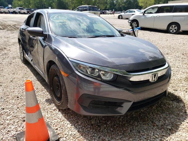 HONDA CIVIC LX 2018 with VIN 19XFC2F59JE034169 - Photo from auction