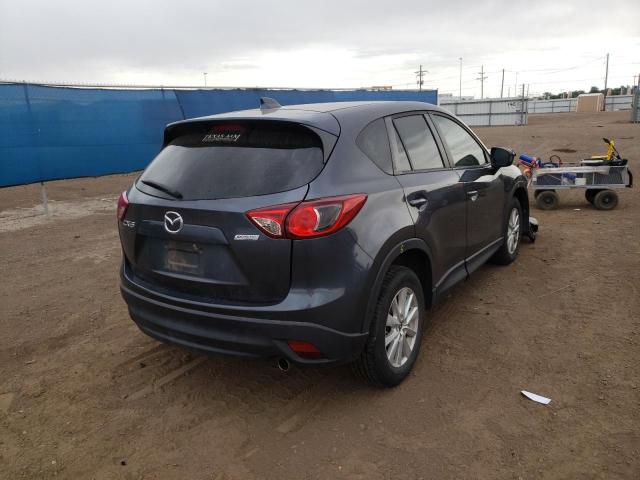Photo 4 from auction – 2013 MAZDA CX-5 SPORT with VIN JM3KE2BEXD0104605