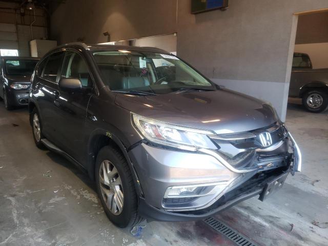 HONDA CR-V EXL 2015 with VIN 2HKRM4H71FH661195 - Photo from auction