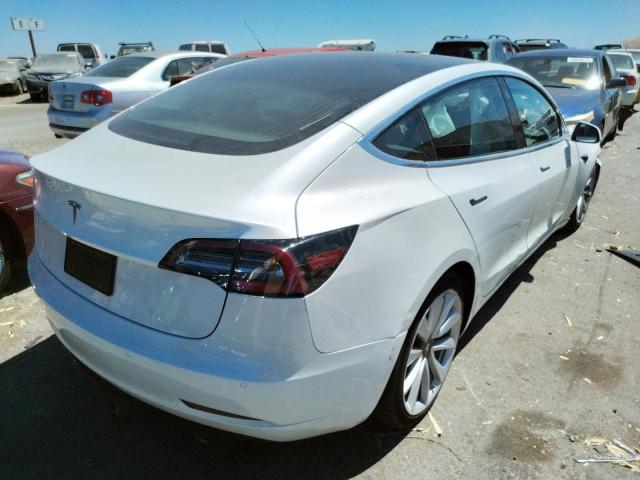 Photo 4 from auction – 2020 TESLA MODEL 3 with VIN 5YJ3E1EA7LF634305