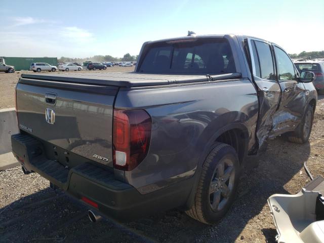 Photo 4 from auction – 2022 HONDA RIDGELINE with VIN 5FPYK3F72NB014890