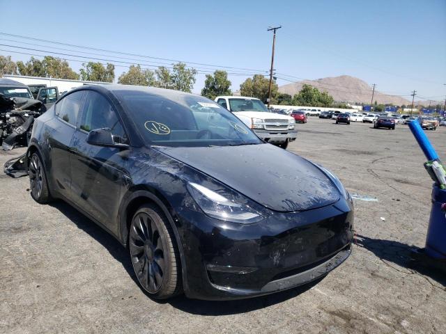 TESLA MODEL Y 2022 with VIN 7SAYGDEF2NF340281 - Photo from auction