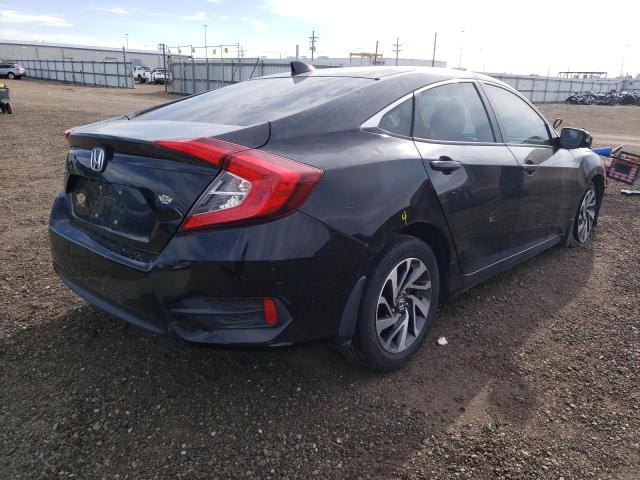 Photo 4 from auction – 2018 HONDA CIVIC EX with VIN 2HGFC2F71JH563056