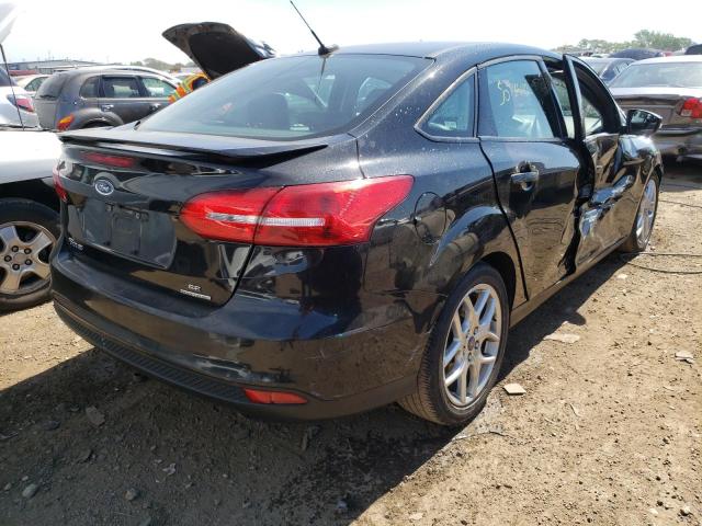 Photo 4 from auction – 2015 FORD FOCUS SE with VIN 1FADP3F26FL283587
