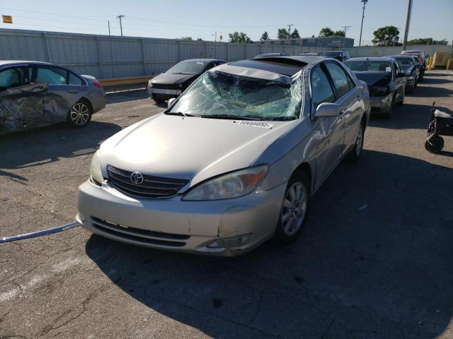 Photo 2 from auction – 2004 TOYOTA CAMRY LE with VIN 4T1BE30K04U306140