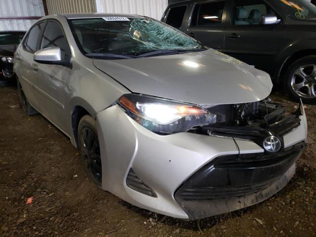TOYOTA COROLLA L 2018 with VIN 5YFBURHE6JP765223 - Photo from auction