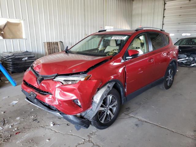 Photo 2 from auction – 2016 TOYOTA RAV4 XLE with VIN JTMRFREV7GJ095658
