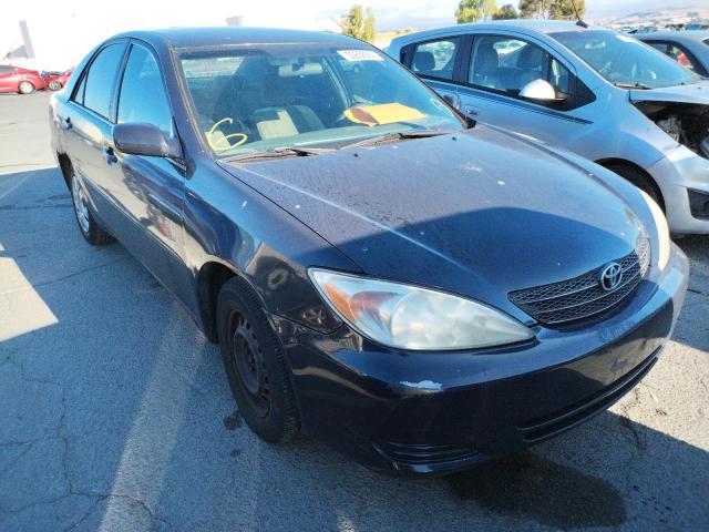 TOYOTA CAMRY LE 2002 with VIN 4T1BE32KX2U513337 - Photo from auction