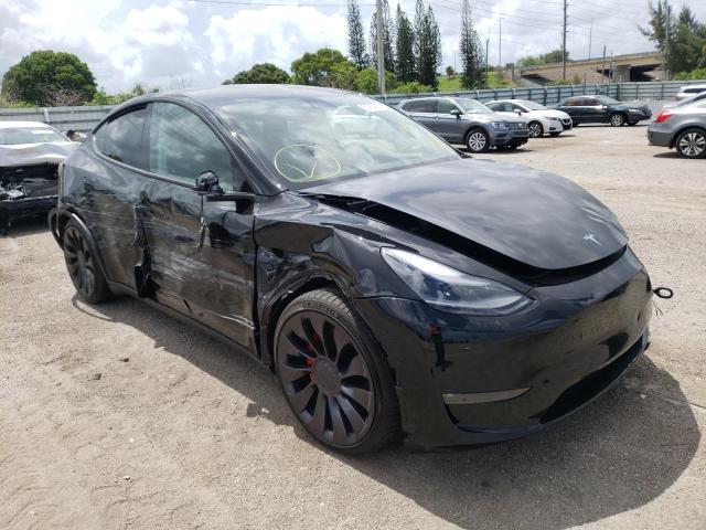 TESLA MODEL Y 2022 with VIN 7SAYGDEF4NF382046 - Photo from auction