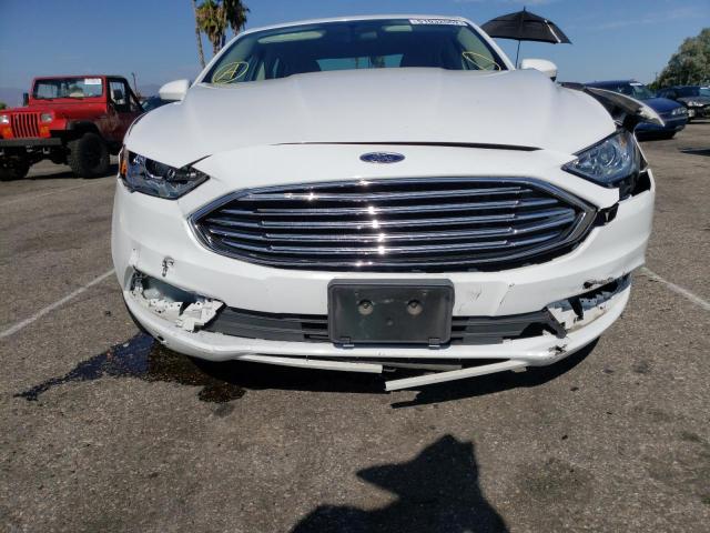 Photo 9 from auction – 2017 FORD FUSION S with VIN 3FA6P0G75HR110181