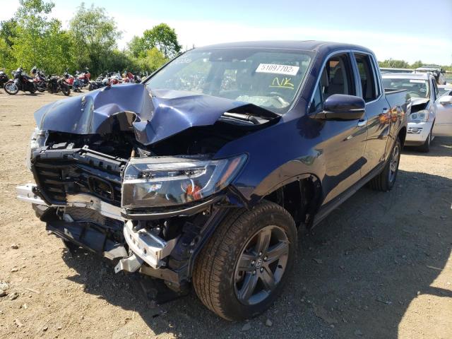 Photo 2 from auction – 2021 HONDA RIDGELINE with VIN 5FPYK3F77MB023227