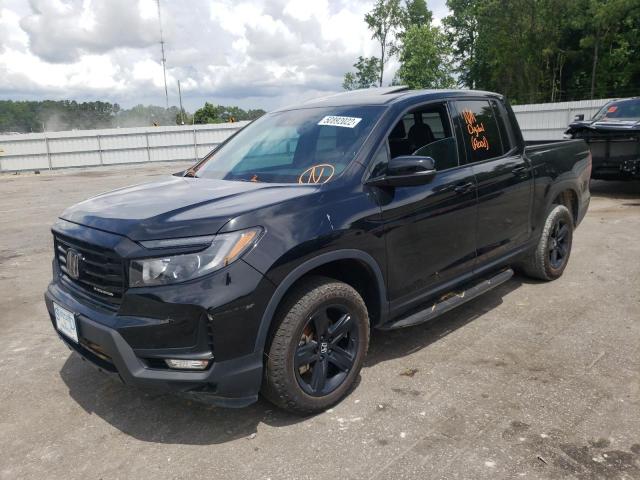 Photo 2 from auction – 2021 HONDA RIDGELINE with VIN 5FPYK3F82MB003704