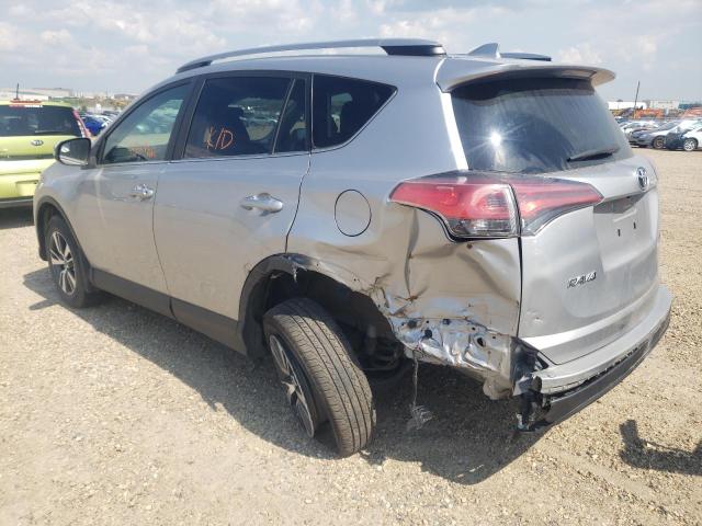 Photo 3 from auction – 2018 TOYOTA RAV4 LE with VIN 2T3BFREV0JW857898