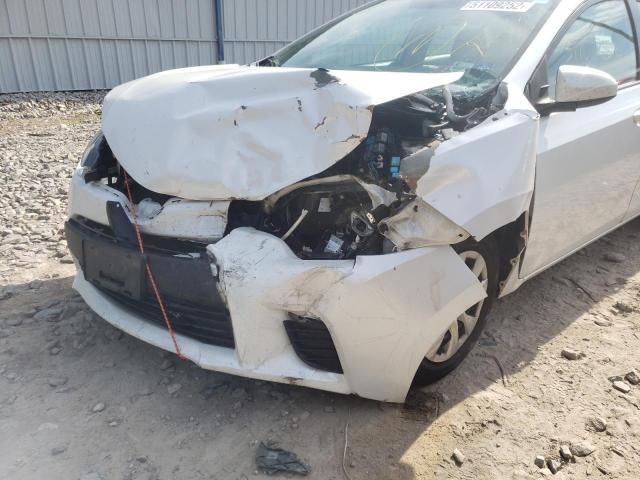 Photo 9 from auction – 2014 TOYOTA COROLLA EC with VIN 5YFBPRHE8EP100935