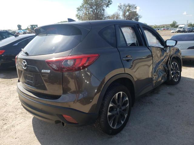 Photo 4 from auction – 2016 MAZDA CX-5 GT with VIN JM3KE2DY5G0665239