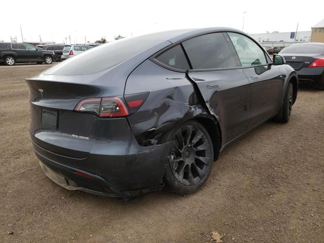 Photo 4 from auction – 2022 TESLA MODEL Y with VIN 7SAYGDEE2NF422826