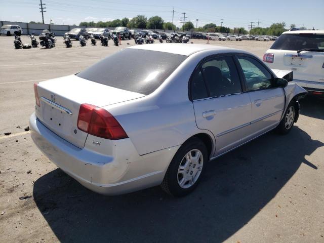 Photo 4 from auction – 2002 HONDA CIVIC LX with VIN 1HGES16552L049156