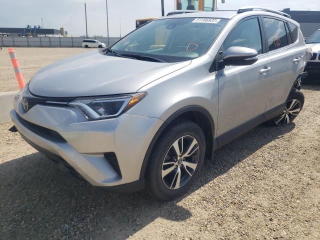 Photo 2 from auction – 2018 TOYOTA RAV4 LE with VIN 2T3BFREV0JW857898