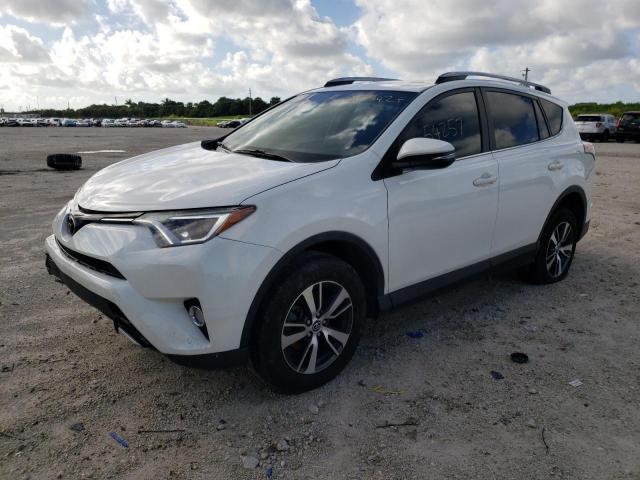 Photo 2 from auction – 2017 TOYOTA RAV4 XLE with VIN JTMWFREV2HJ720469
