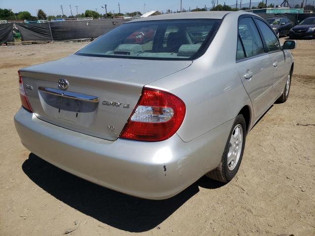 Photo 4 from auction – 2002 TOYOTA CAMRY LE with VIN 4T1BF30K42U034640