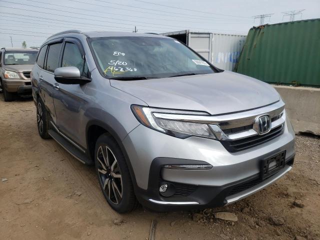 Photo 1 from auction – 2021 HONDA PILOT ELIT with VIN 5FNYF6H00MB018059